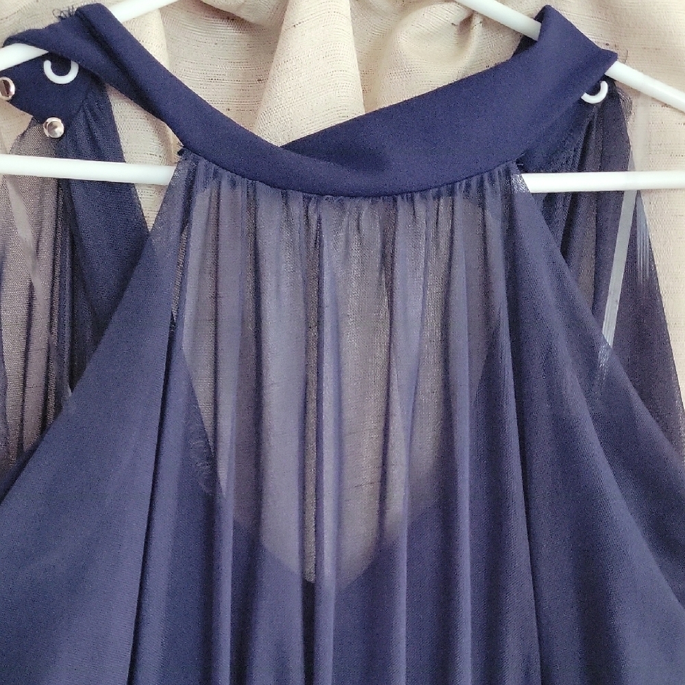 Sophisticated Blue Jumpsuit with Wide-Leg Pants and High Neckline - Picture 3 of 6